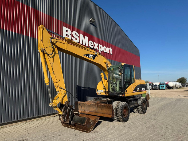 Caterpillar M 316 C - Grävmaskin på däck: bild 1 Caterpillar M 316 C - Grävmaskin på däck: bild 1