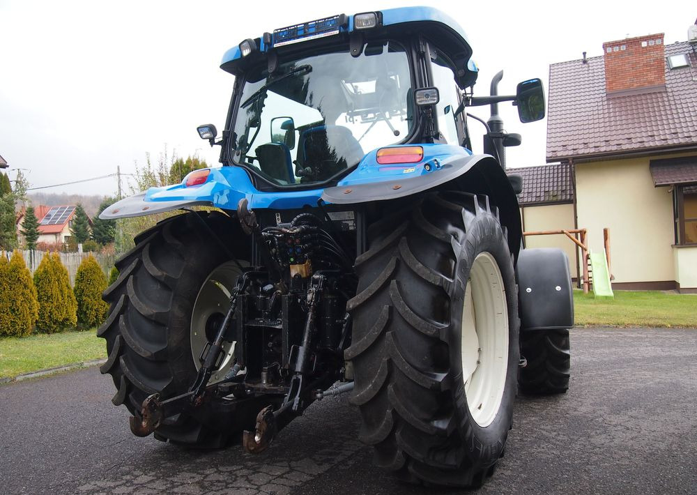 Ciągnik New Holland NH TS125A 6 cylindrów 2004 Ciągnik rolniczy New Holland TS125A - Traktor: bild 5 Ciągnik New Holland NH TS125A 6 cylindrów 2004 Ciągnik rolniczy New Holland TS125A - Traktor: bild 5
