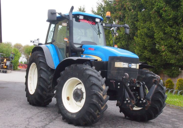 Ciągnik New Holland TM 140 2004 Przedni TUZ - Traktor: bild 2 Ciągnik New Holland TM 140 2004 Przedni TUZ - Traktor: bild 2