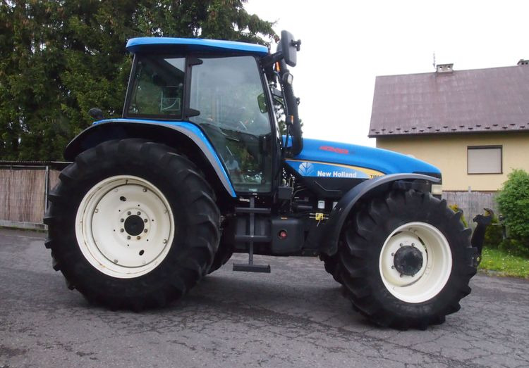 Ciągnik New Holland TM 140 2004 Przedni TUZ - Traktor: bild 4 Ciągnik New Holland TM 140 2004 Przedni TUZ - Traktor: bild 4