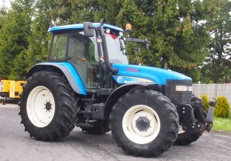 Ciągnik New Holland TM 140 2004 Przedni TUZ - Traktor: bild 1 Ciągnik New Holland TM 140 2004 Przedni TUZ - Traktor: bild 1
