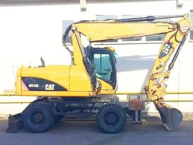 Caterpillar M 315 D - Grävmaskin på däck: bild 1 Caterpillar M 315 D - Grävmaskin på däck: bild 1