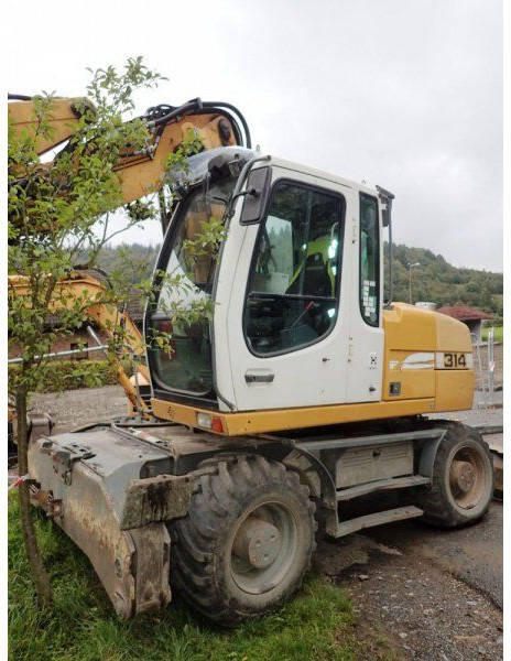 Liebherr A 314 - Grävmaskin på däck: bild 1 Liebherr A 314 - Grävmaskin på däck: bild 1