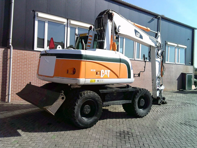 Caterpillar M313D - Grävmaskin på däck: bild 4 Caterpillar M313D - Grävmaskin på däck: bild 4