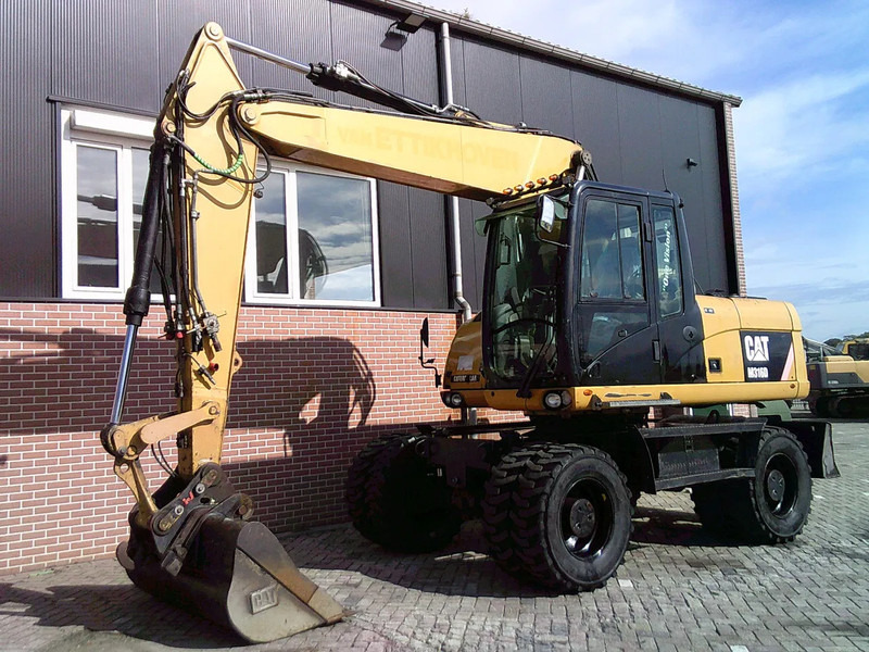 Caterpillar M316D - Grävmaskin på däck: bild 1 Caterpillar M316D - Grävmaskin på däck: bild 1