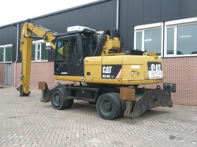 Caterpillar M318D - Grävmaskin på däck: bild 2 Caterpillar M318D - Grävmaskin på däck: bild 2