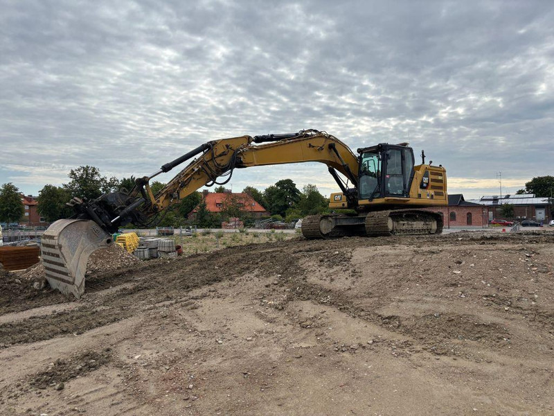 Caterpillar 323 - Bandgrävare: bild 1 Caterpillar 323 - Bandgrävare: bild 1