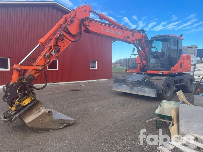 Doosan DX160W - Grävmaskin på däck: bild 1 Doosan DX160W - Grävmaskin på däck: bild 1