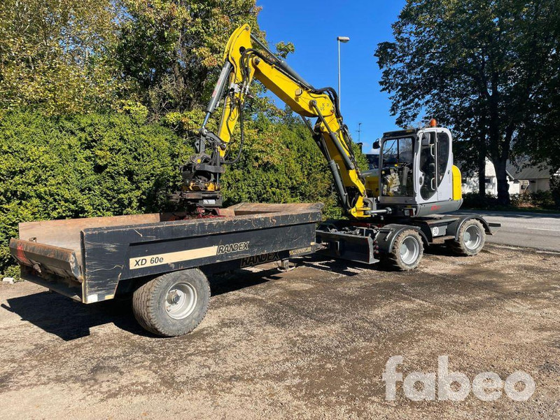 WACKER NEUSON EW100 - Grävmaskin på däck: bild 1 WACKER NEUSON EW100 - Grävmaskin på däck: bild 1