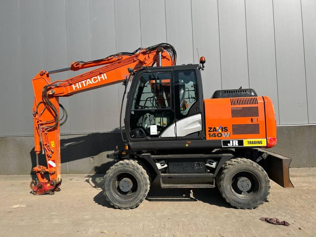 Hitachi ZX 140 W-5B  - Grävmaskin på däck: bild 1 Hitachi ZX 140 W-5B  - Grävmaskin på däck: bild 1
