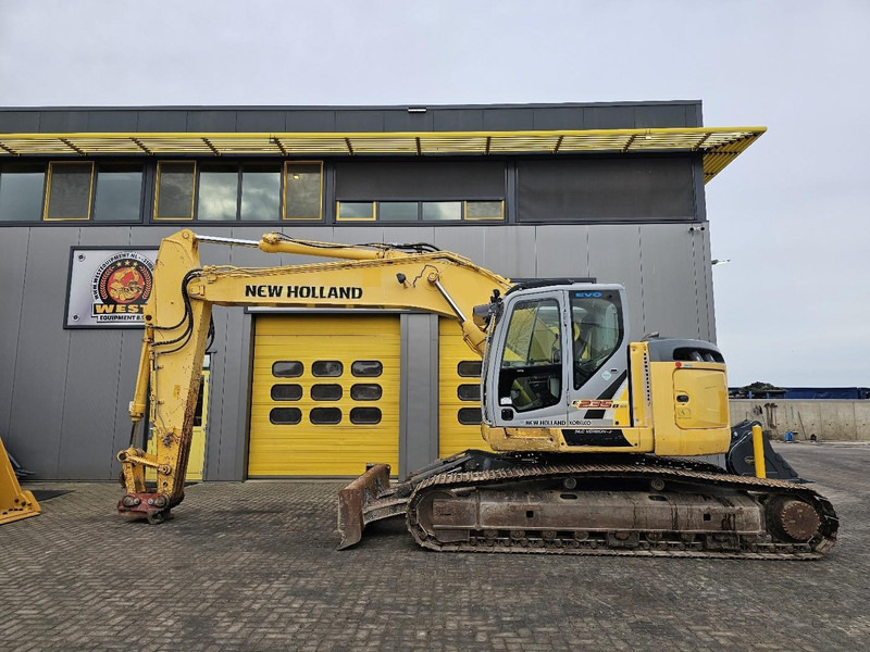 New Holland E235BSR-2 - Bandgrävare: bild 1 New Holland E235BSR-2 - Bandgrävare: bild 1