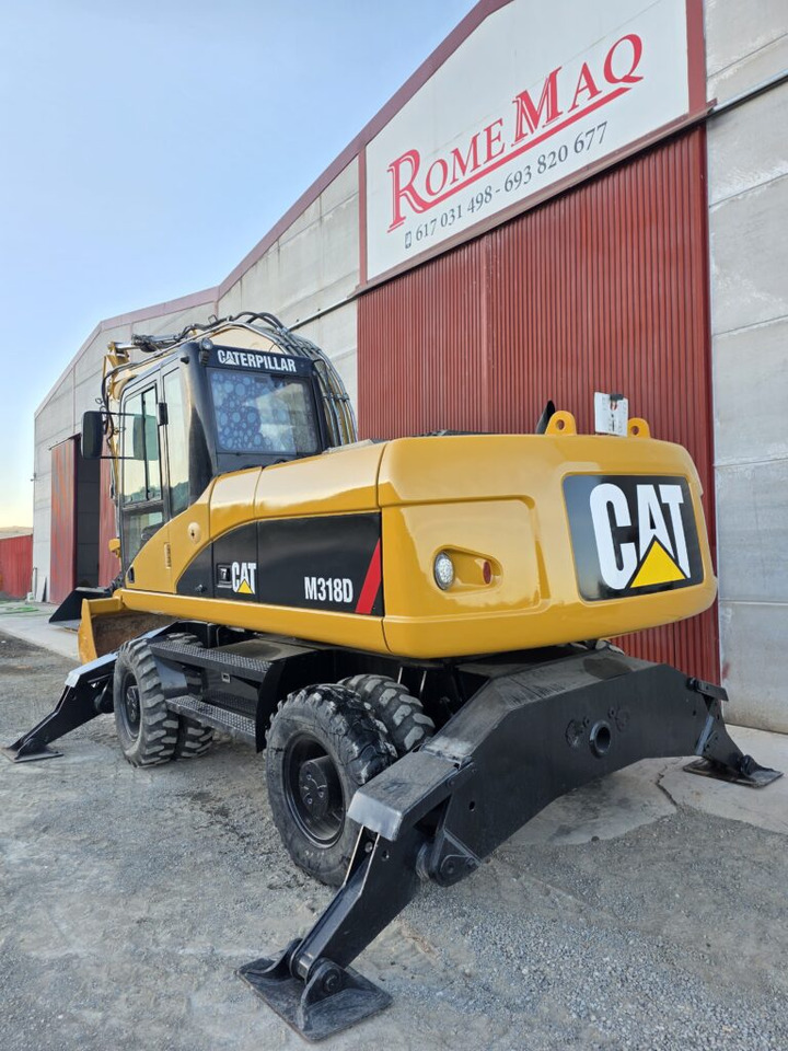 CAT M318D - Grävmaskin på däck: bild 2 CAT M318D - Grävmaskin på däck: bild 2