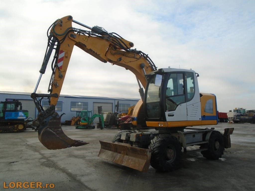 Liebherr A 914 Compact  - Grävmaskin på däck: bild 1 Liebherr A 914 Compact  - Grävmaskin på däck: bild 1