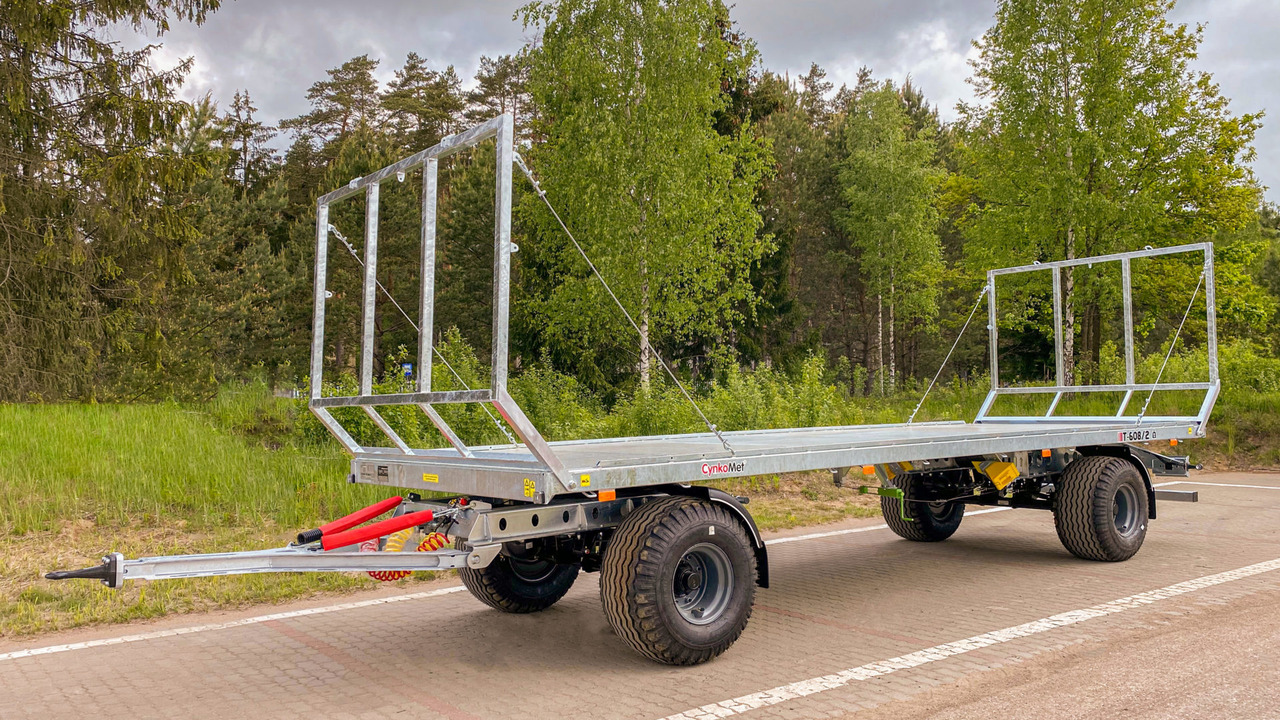 Cynkomet Ballentransportwagen / Bale platform / Remorque pour balles / Rimorchio per balle / Przyczepa do przewozu bel - Flakvagn för lantbruk: bild 1 Cynkomet Ballentransportwagen / Bale platform / Remorque pour balles / Rimorchio per balle / Przyczepa do przewozu bel - Flakvagn för lantbruk: bild 1