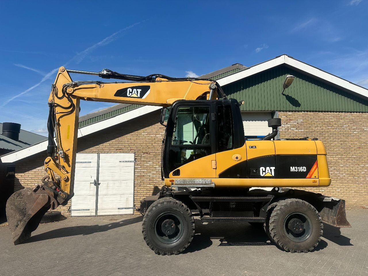 Caterpillar M316D - Hjullastare: bild 1 Caterpillar M316D - Hjullastare: bild 1