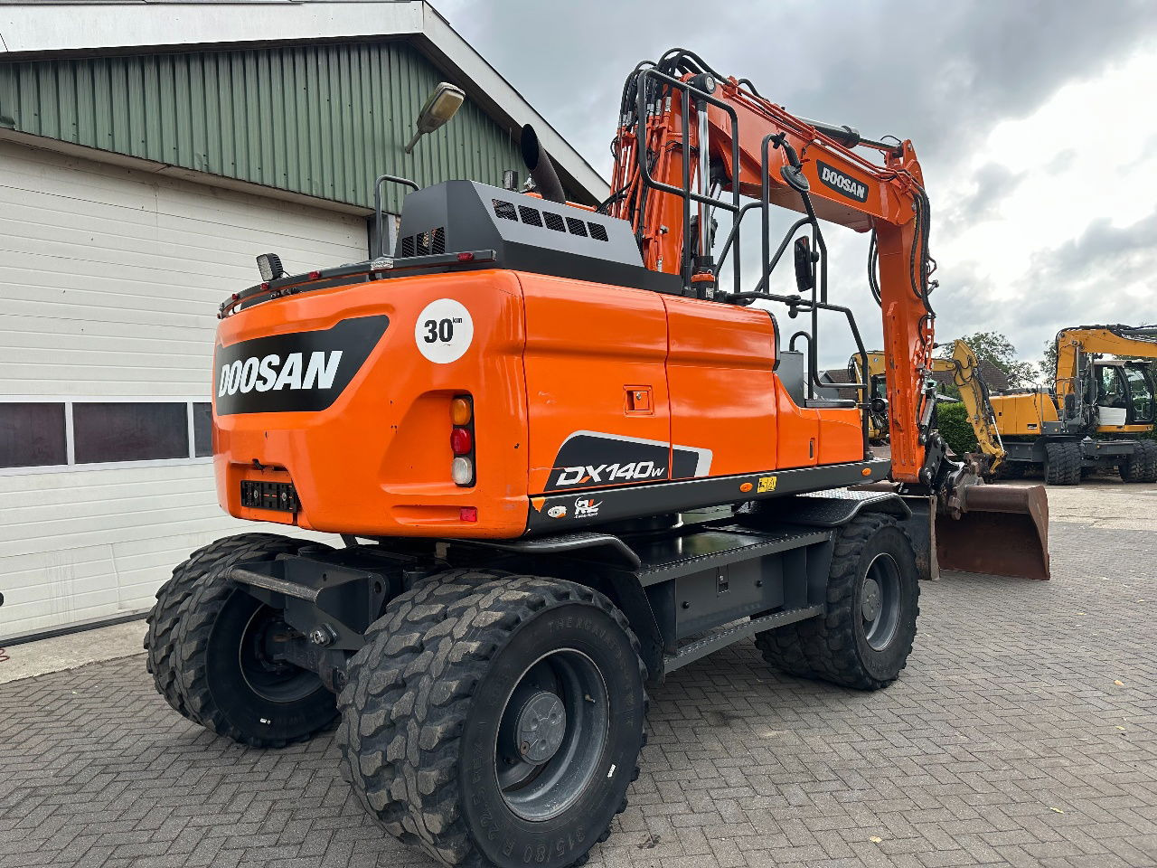 Doosan DX140W-5 - Grävmaskin på däck: bild 4 Doosan DX140W-5 - Grävmaskin på däck: bild 4