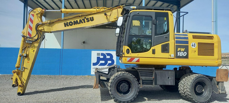 Komatsu PW180-10 - Grävmaskin på däck: bild 1 Komatsu PW180-10 - Grävmaskin på däck: bild 1