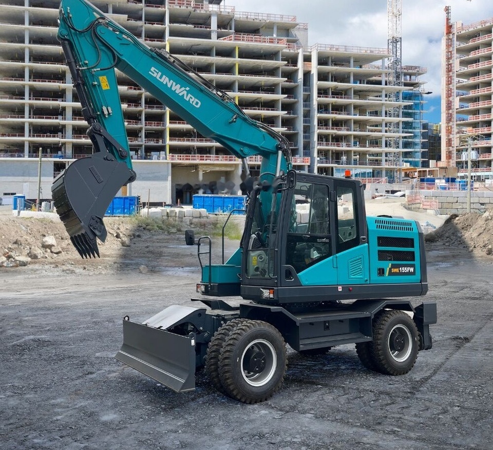 Sunward - Grävmaskin på däck: bild 1 Sunward - Grävmaskin på däck: bild 1