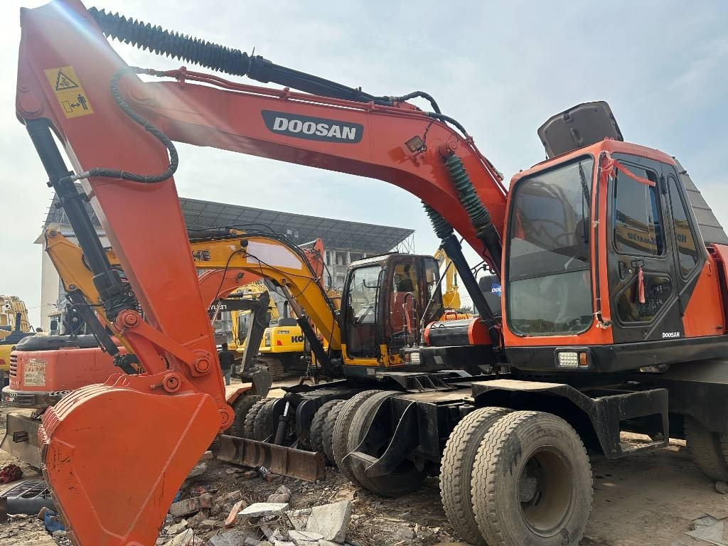 Doosan DX 150W -9 - Grävmaskin på däck: bild 5 Doosan DX 150W -9 - Grävmaskin på däck: bild 5