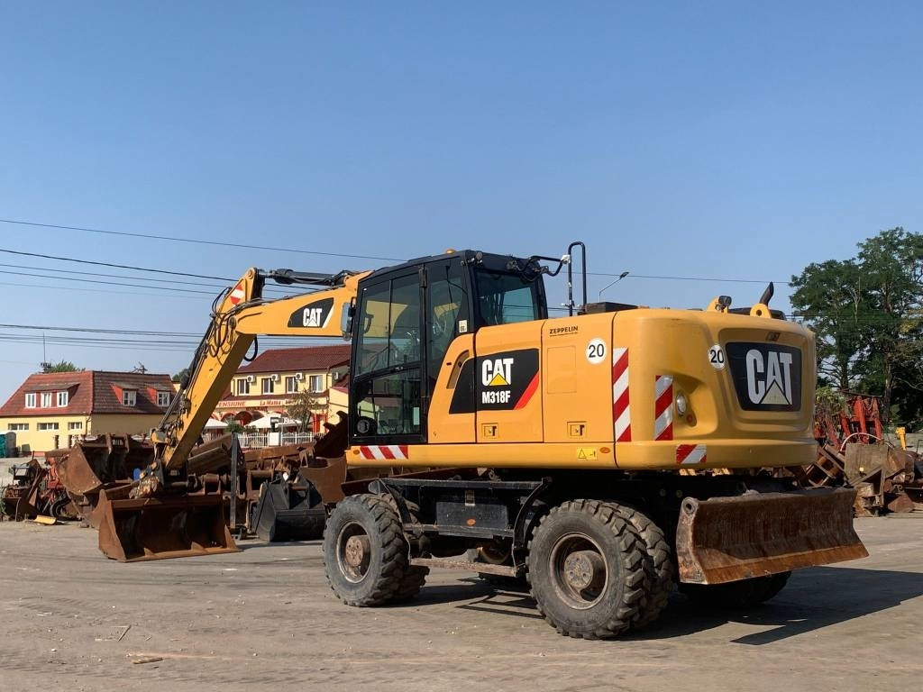 CAT M 318 F  - Grävmaskin på däck: bild 3 CAT M 318 F  - Grävmaskin på däck: bild 3