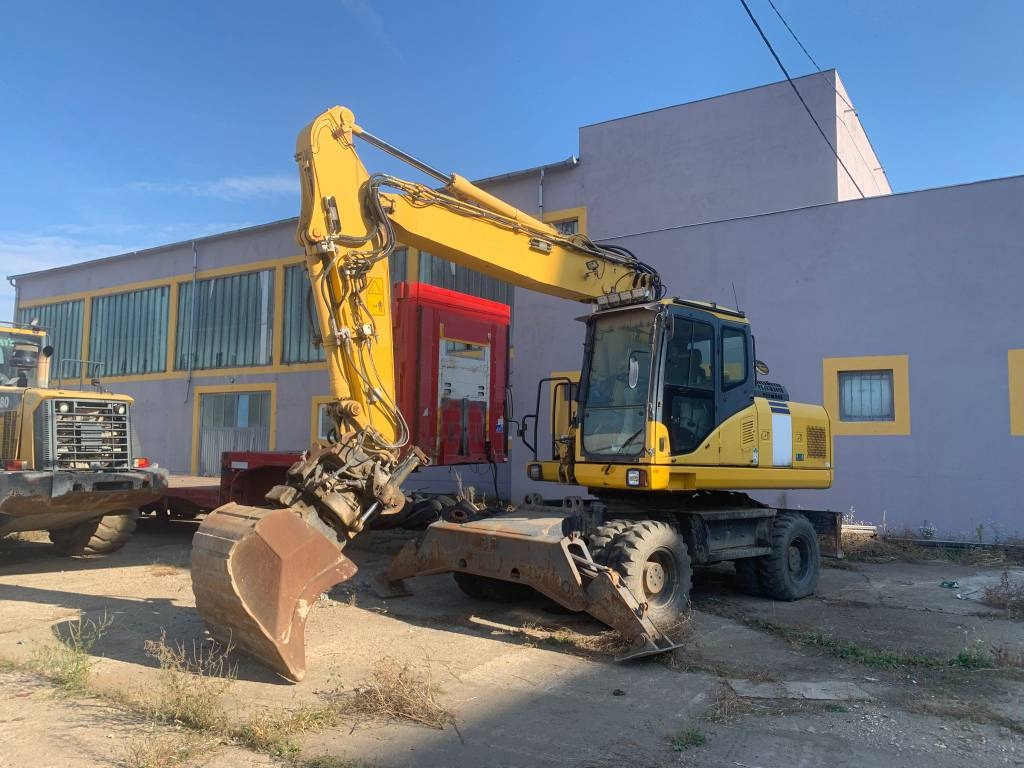 Komatsu PW180-E0+Engcon Rototilt  - Grävmaskin på däck: bild 1 Komatsu PW180-E0+Engcon Rototilt  - Grävmaskin på däck: bild 1