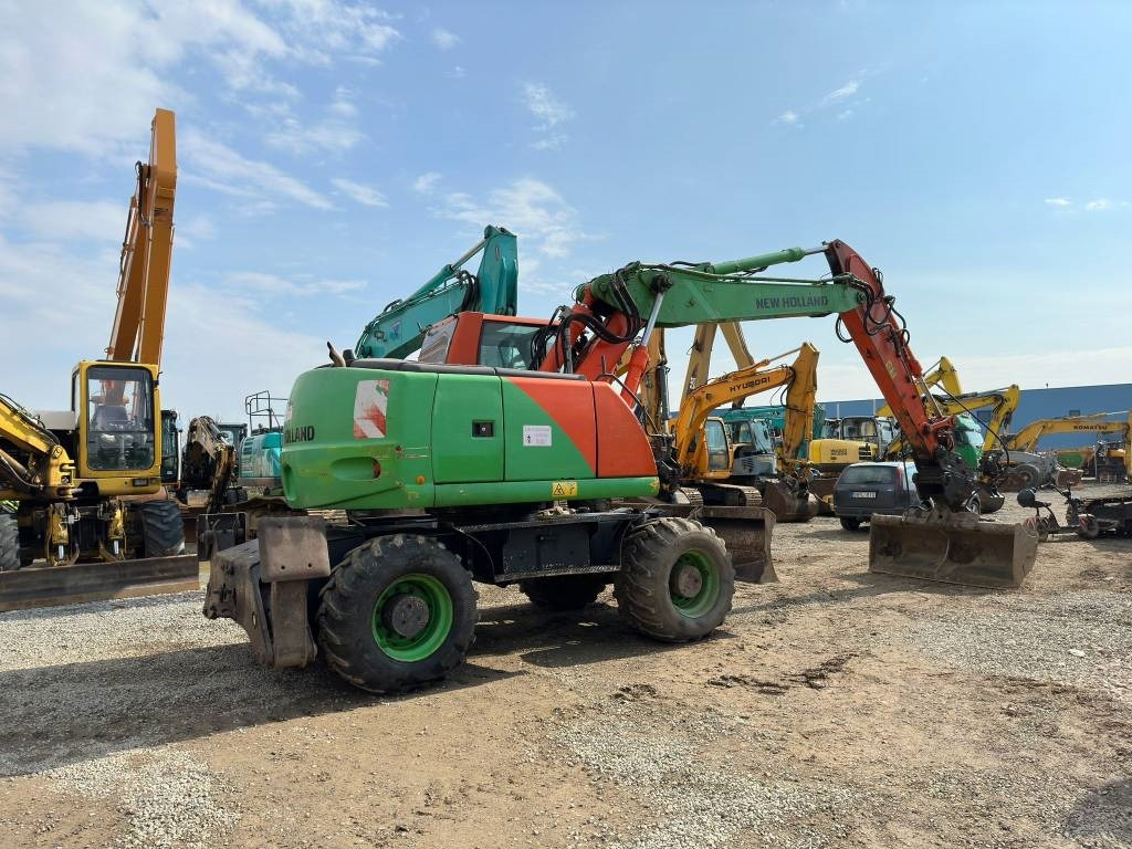New Holland MH Plus  - Grävmaskin på däck: bild 4 New Holland MH Plus  - Grävmaskin på däck: bild 4