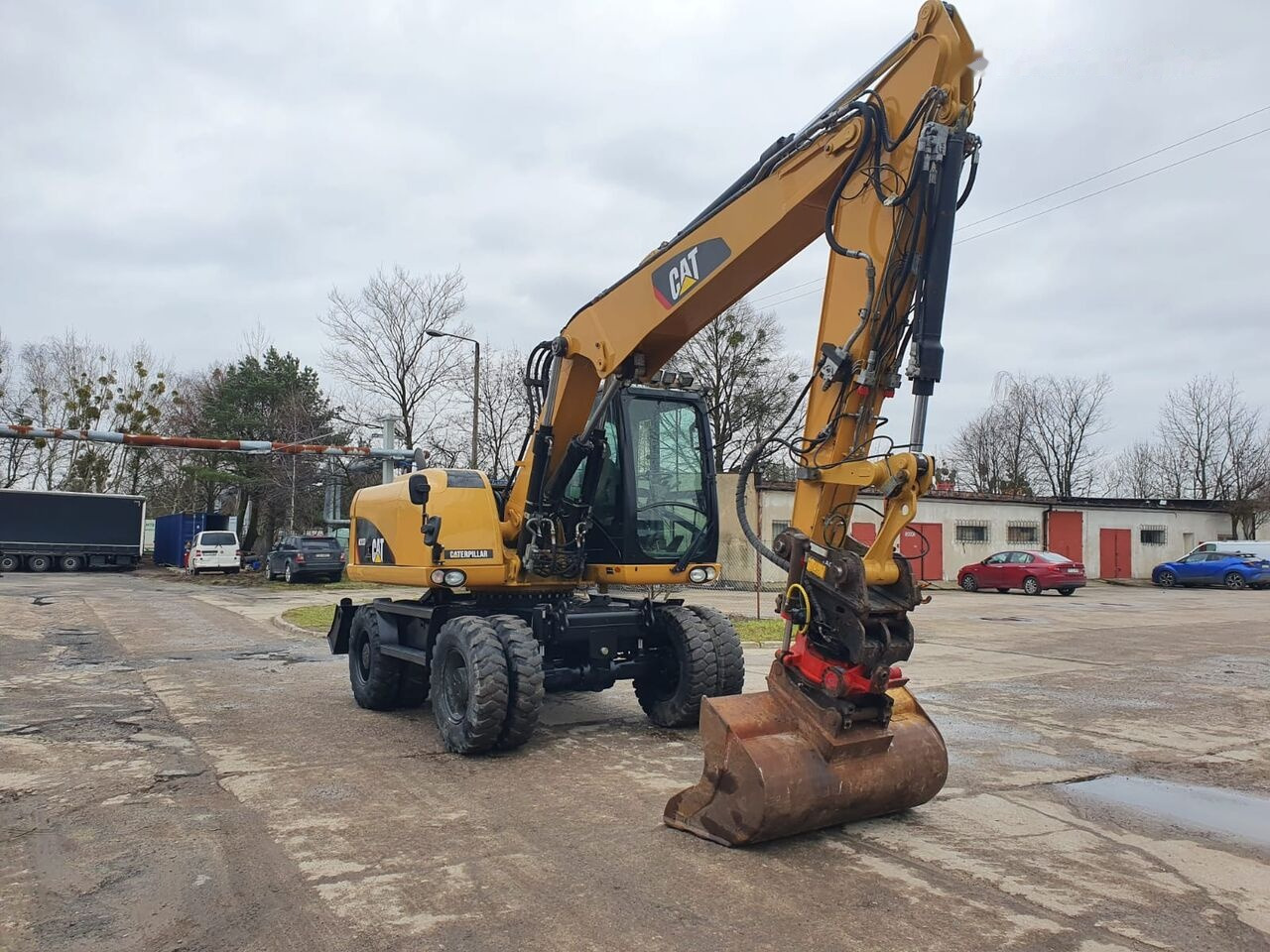 Caterpillar M 313 D Tiltrotator - Grävmaskin på däck: bild 5 Caterpillar M 313 D Tiltrotator - Grävmaskin på däck: bild 5