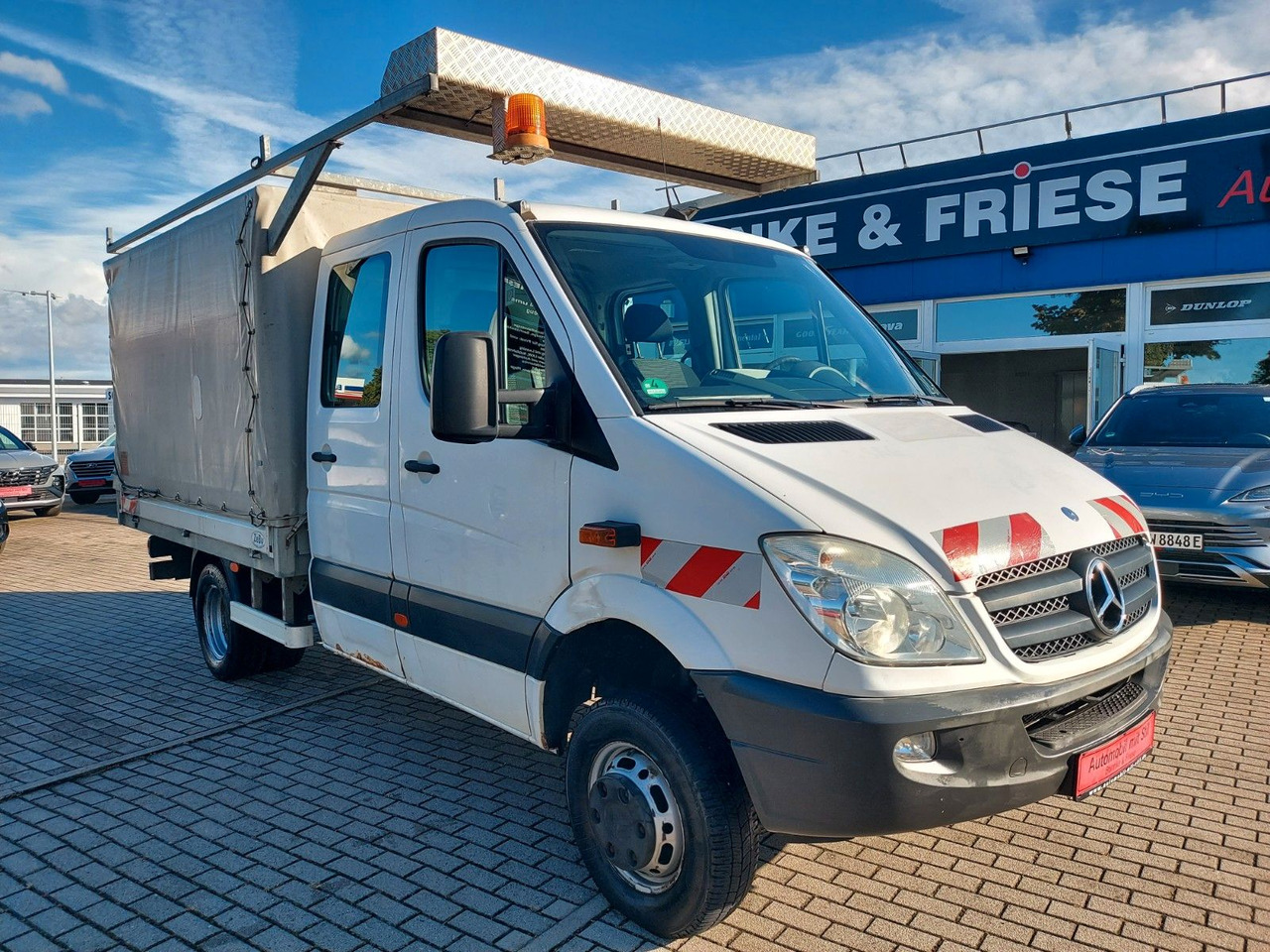 Mercedes-Benz Sprinter II Pritsche DoKa 516 4X4 Plane 6 Sitze - Transportbil med kapell, Dubbelhytt transportbil: bild 1 Mercedes-Benz Sprinter II Pritsche DoKa 516 4X4 Plane 6 Sitze - Transportbil med kapell, Dubbelhytt transportbil: bild 1