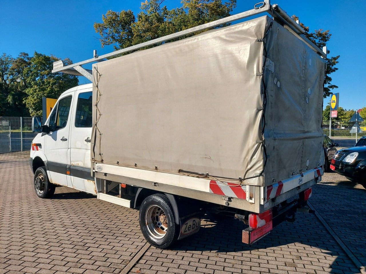 Mercedes-Benz Sprinter II Pritsche DoKa 516 4X4 Plane 6 Sitze - Transportbil med kapell, Dubbelhytt transportbil: bild 4 Mercedes-Benz Sprinter II Pritsche DoKa 516 4X4 Plane 6 Sitze - Transportbil med kapell, Dubbelhytt transportbil: bild 4