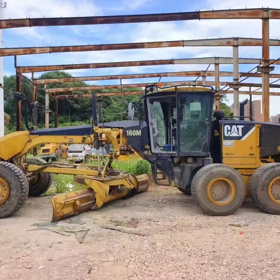 Original CAT 160M Grader Used Caterpillar Brand CAT 140H 140K 160K 120H 14G Motor Grader High Quality - Väghyvel: bild 1 Original CAT 160M Grader Used Caterpillar Brand CAT 140H 140K 160K 120H 14G Motor Grader High Quality - Väghyvel: bild 1