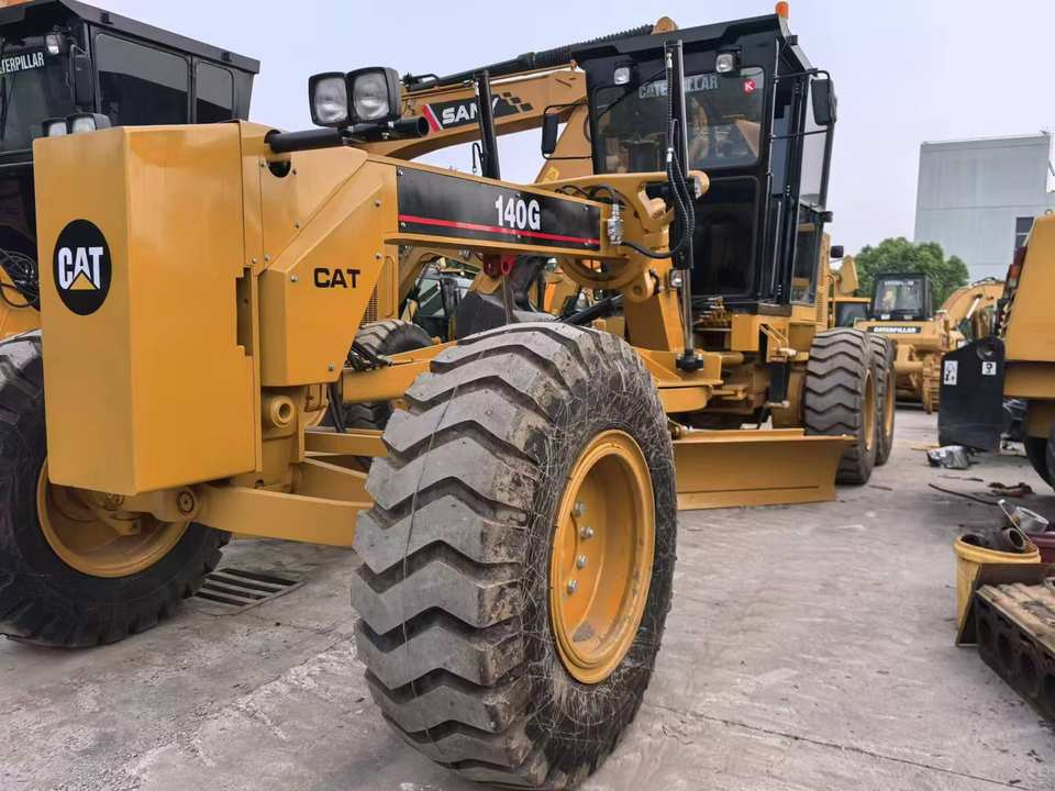 Second Hand Used Construction Machinery Japanese CAT 140G Grader Caterpillar Brand for Sale With Good Condition and Price - Väghyvel: bild 2 Second Hand Used Construction Machinery Japanese CAT 140G Grader Caterpillar Brand for Sale With Good Condition and Price - Väghyvel: bild 2
