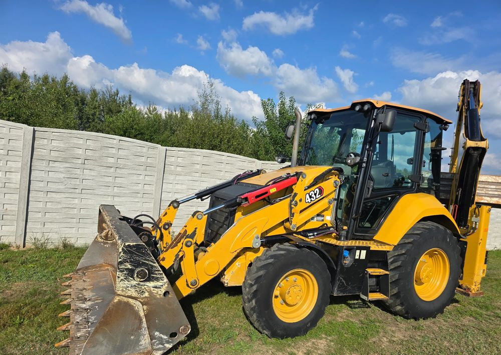 Caterpillar - Grävlastare: bild 1 Caterpillar - Grävlastare: bild 1