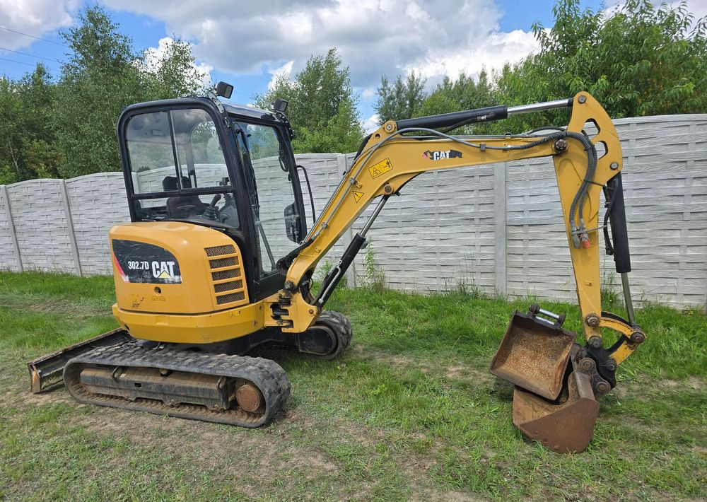 Caterpillar - Minigrävmaskin: bild 1 Caterpillar - Minigrävmaskin: bild 1