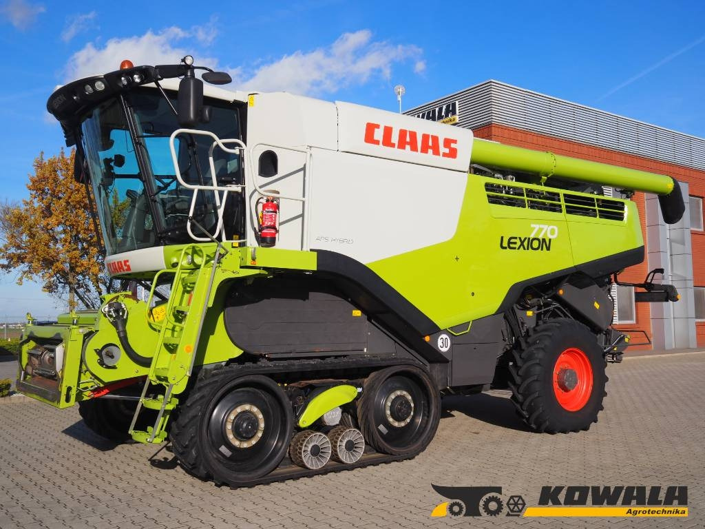 Claas Lexion 770TT 4x4 + V1200 - Skördetröska: bild 1 Claas Lexion 770TT 4x4 + V1200 - Skördetröska: bild 1