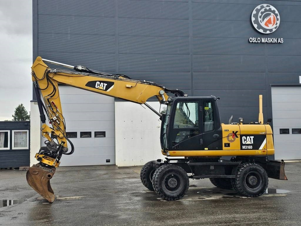 CAT M 316 D - Grävmaskin på däck: bild 2 CAT M 316 D - Grävmaskin på däck: bild 2