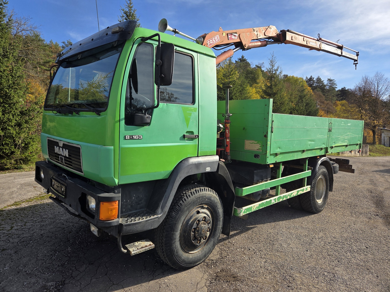 MAN 8.163 4x4 + crane FASSI F45A.22 - Flakbil: bild 1 MAN 8.163 4x4 + crane FASSI F45A.22 - Flakbil: bild 1