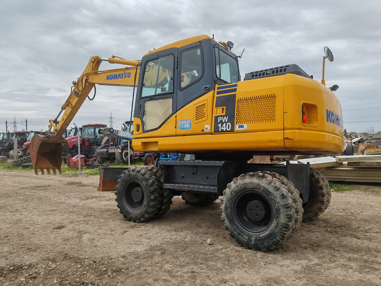 Komatsu PW140-7 - Grävmaskin på däck: bild 5 Komatsu PW140-7 - Grävmaskin på däck: bild 5