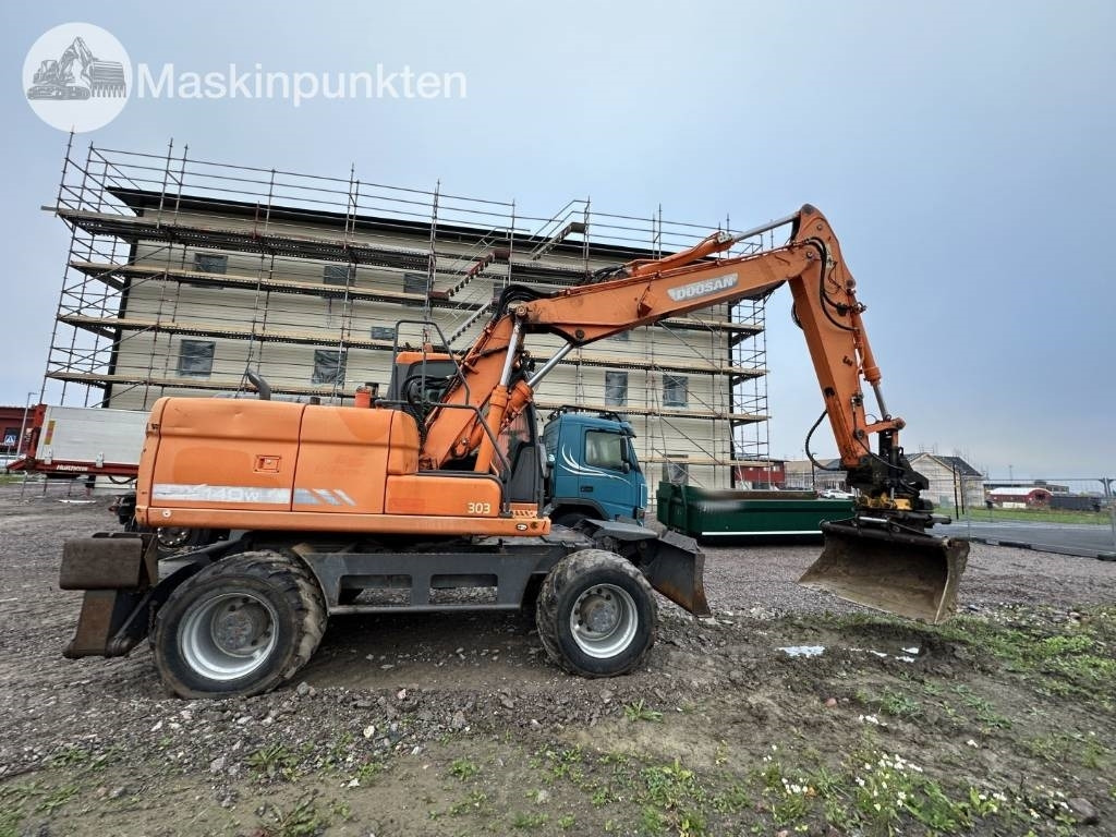 Doosan DX 140 W med vagn och redskap  - Grävmaskin på däck: bild 3 Doosan DX 140 W med vagn och redskap  - Grävmaskin på däck: bild 3