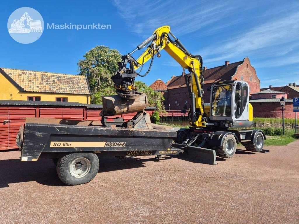 Wacker Neuson EW 100 med vagn - Grävmaskin på däck: bild 1 Wacker Neuson EW 100 med vagn - Grävmaskin på däck: bild 1