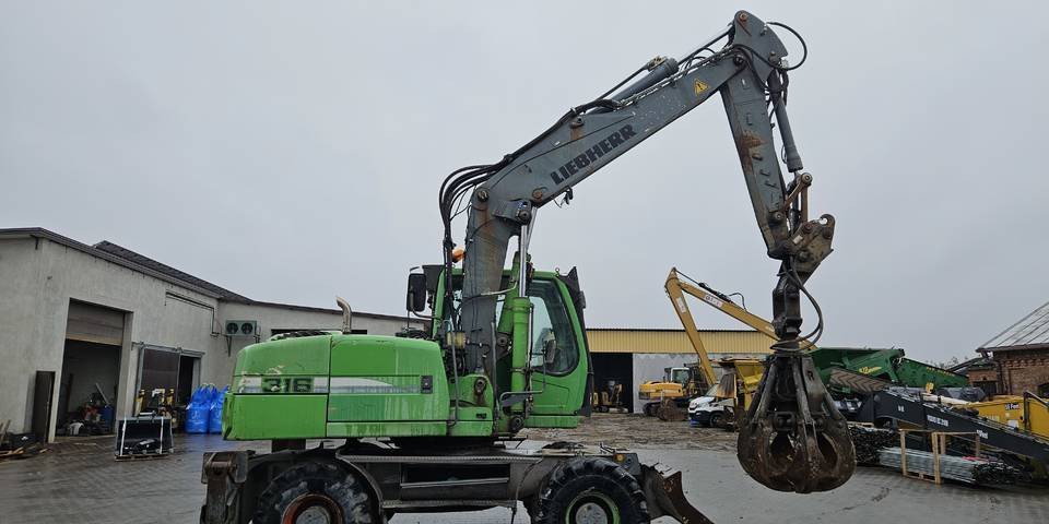 Koparka kołowa Liebherr A 316 Litronic chwytak podpory pług - Grävmaskin på däck: bild 4 Koparka kołowa Liebherr A 316 Litronic chwytak podpory pług - Grävmaskin på däck: bild 4