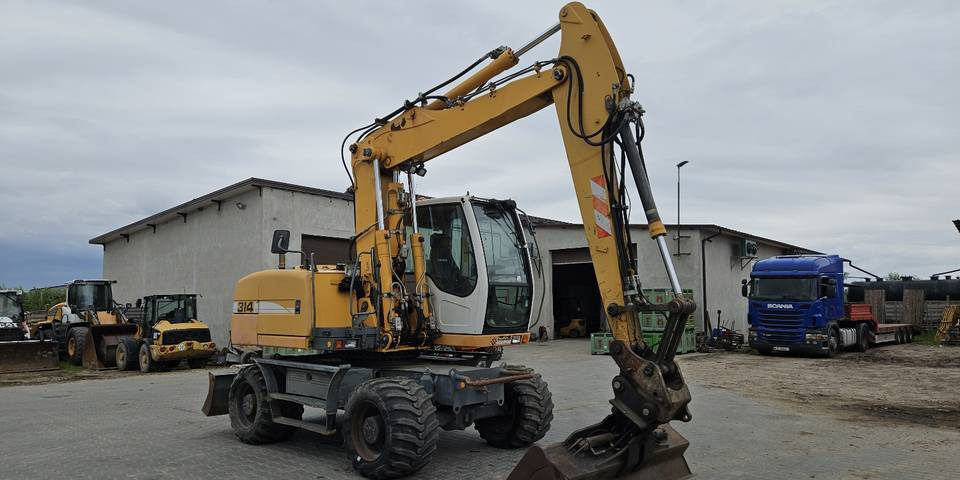 Koparka kołowa Liebherr A314 Litronic 9350 h 4 łyżki kołówka - Grävmaskin på däck: bild 4 Koparka kołowa Liebherr A314 Litronic 9350 h 4 łyżki kołówka - Grävmaskin på däck: bild 4