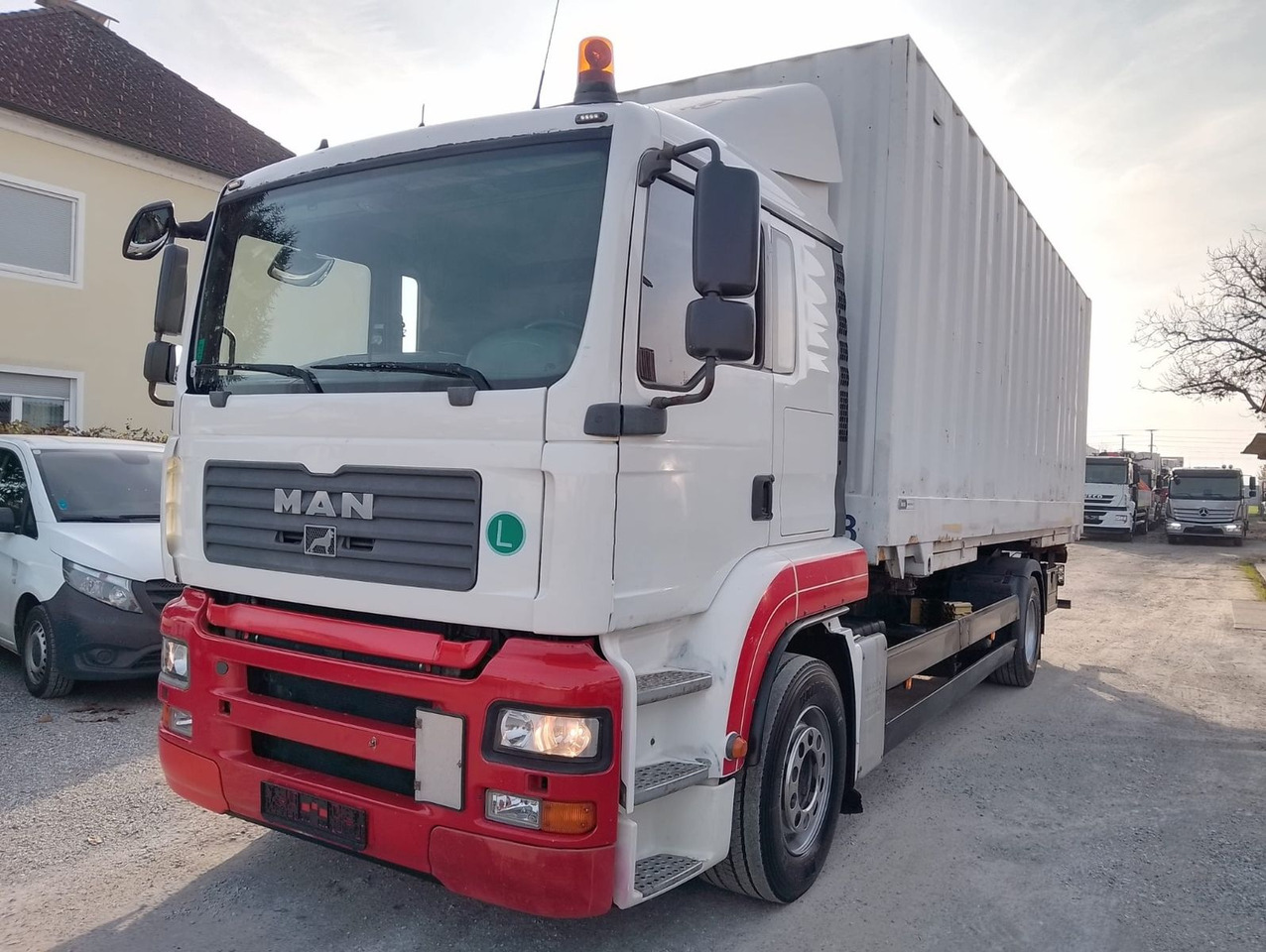 MAN TGA 18 320 - Containerbil/ Växelflak lastbil: bild 1 MAN TGA 18 320 - Containerbil/ Växelflak lastbil: bild 1