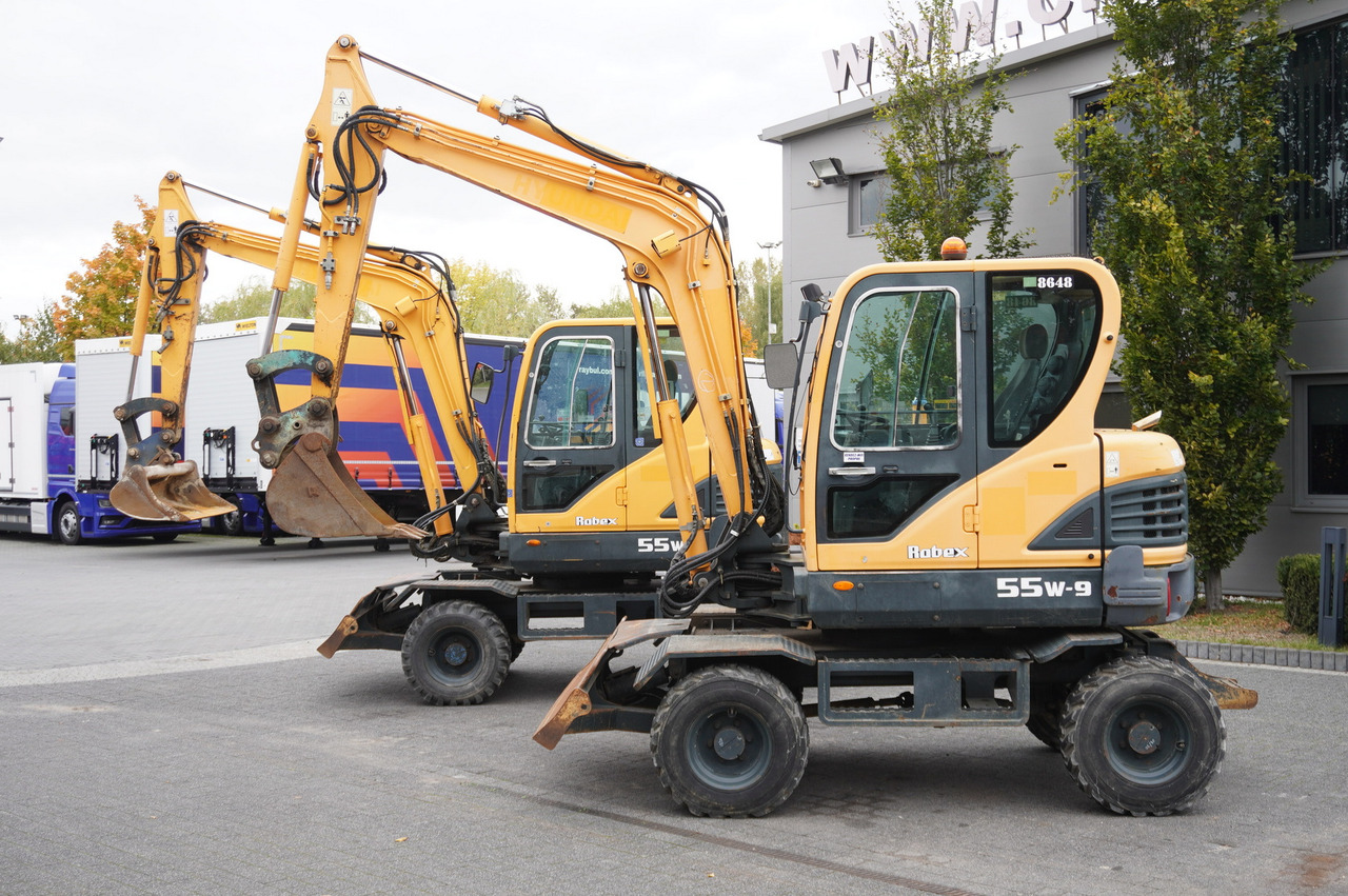 Hyundai Robex 55W-9 Wheeled Excavator 5.5t / 2pcs - Minigrävmaskin: bild 1 Hyundai Robex 55W-9 Wheeled Excavator 5.5t / 2pcs - Minigrävmaskin: bild 1