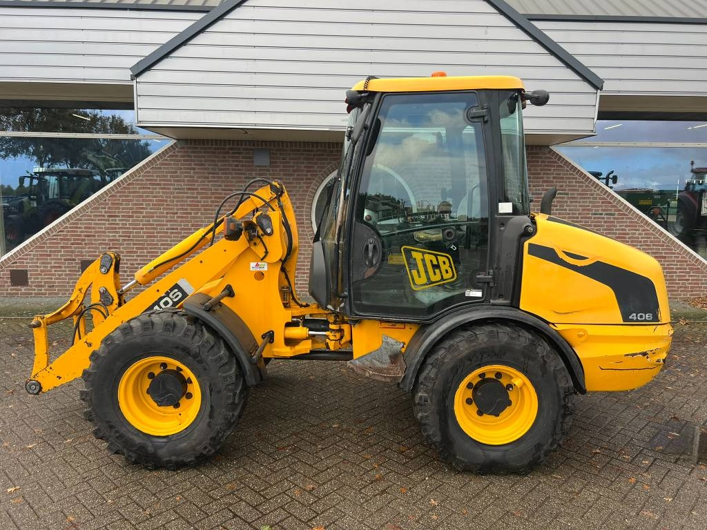 JCB 406 shovel - Minilastare: bild 1 JCB 406 shovel - Minilastare: bild 1