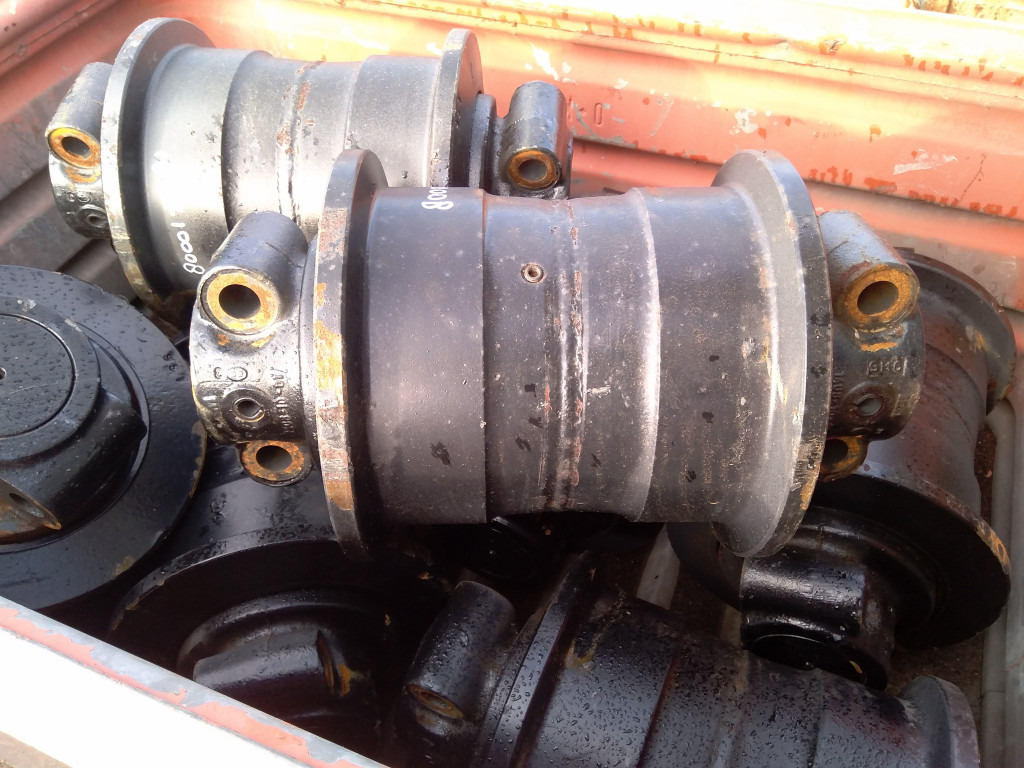 O&K UQ908D00N00008 - - Larvband - Rulle för Byggmaskiner: bild 1 O&K UQ908D00N00008 - - Larvband - Rulle för Byggmaskiner: bild 1