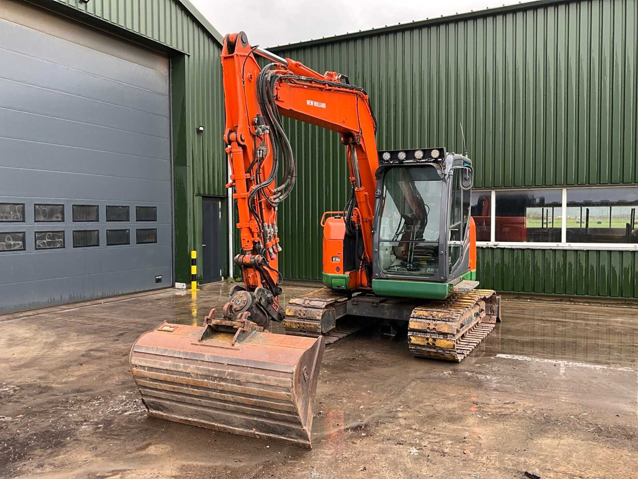 2012 NEW HOLLAND E70BSR-2 MIDI EXCAVATOR - Grävmaskin: bild 1 2012 NEW HOLLAND E70BSR-2 MIDI EXCAVATOR - Grävmaskin: bild 1