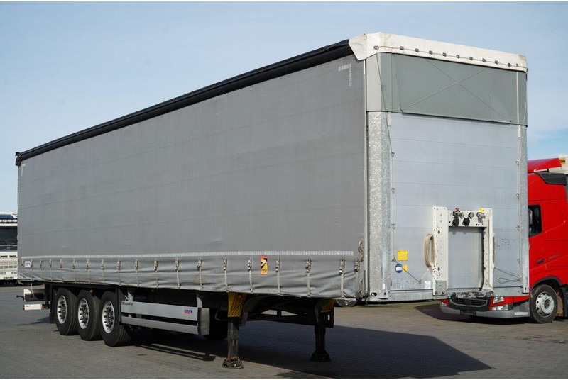 Schmitz Cargobull FIRANKA / STANDARD / OŚ PODNOSZONA / DACH PODNOSZONY - Kapelltrailer: bild 1 Schmitz Cargobull FIRANKA / STANDARD / OŚ PODNOSZONA / DACH PODNOSZONY - Kapelltrailer: bild 1