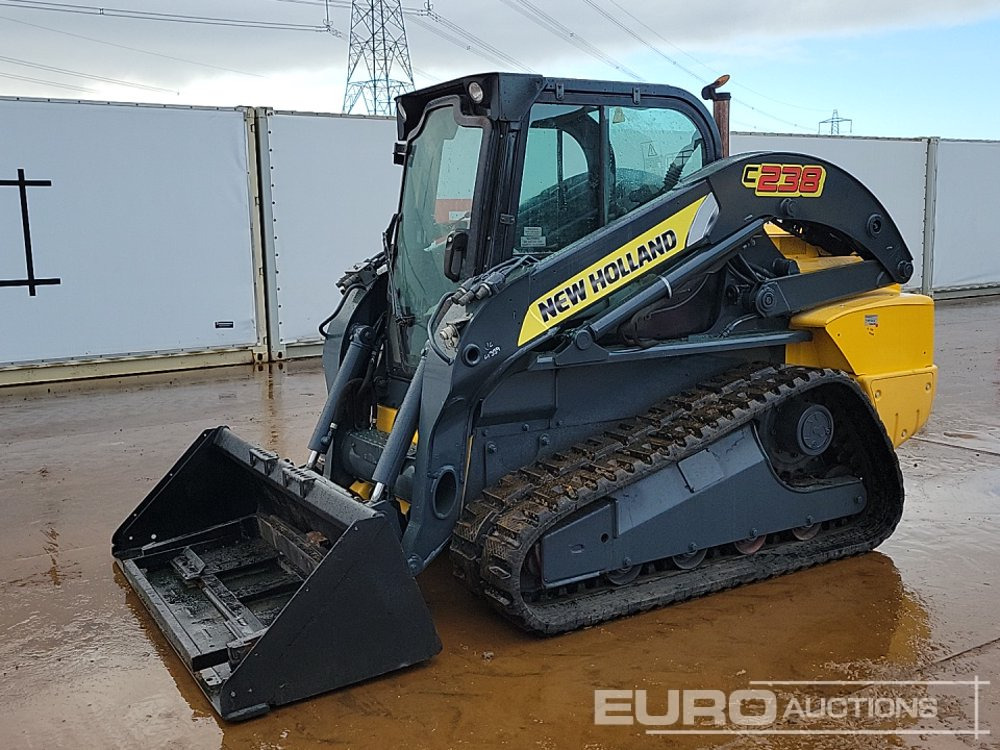 New Holland C238 - Kompaktlastare/ Slirstyrda lastare: bild 1 New Holland C238 - Kompaktlastare/ Slirstyrda lastare: bild 1