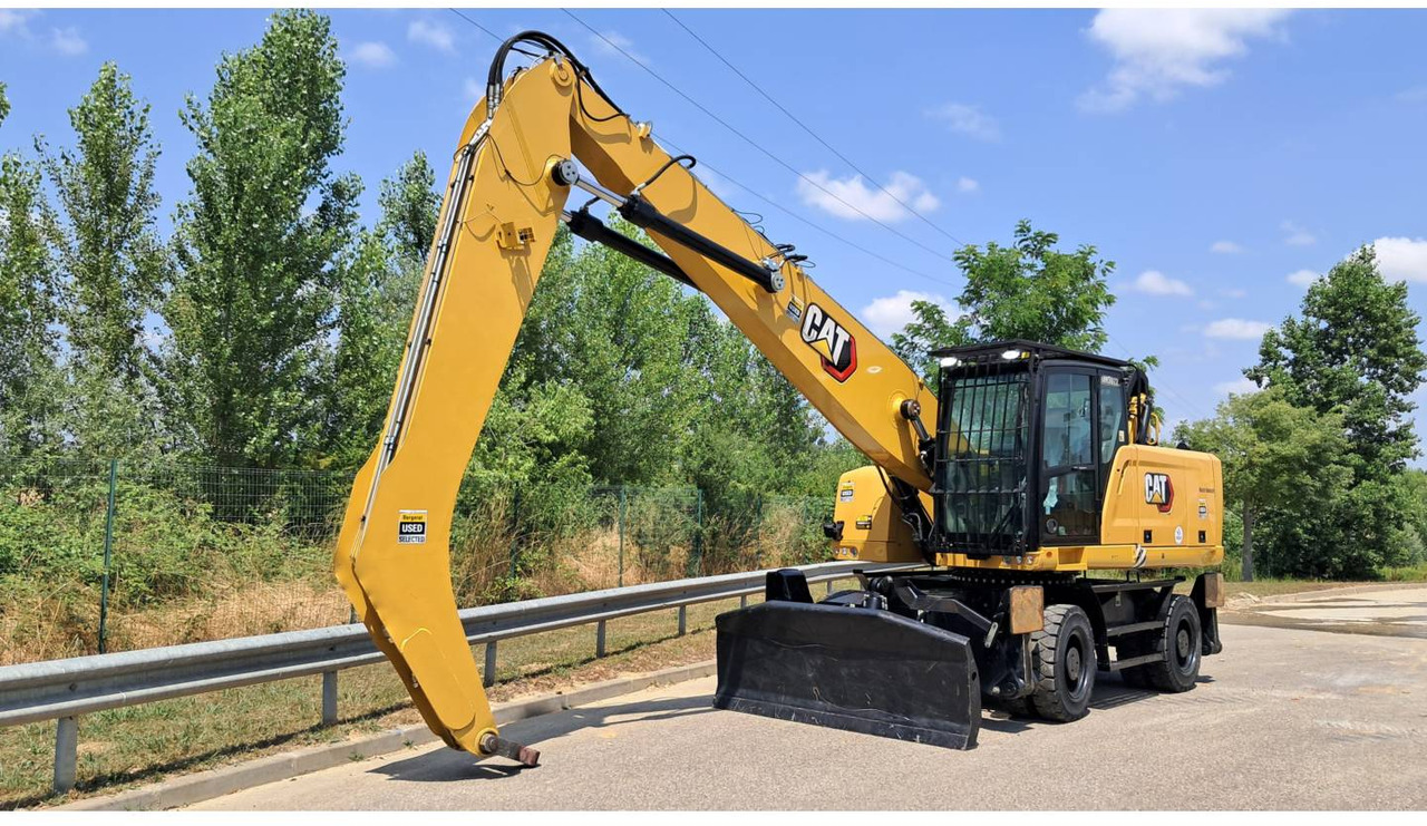 CAT MH3022-1 - Grävmaskin på däck: bild 1 CAT MH3022-1 - Grävmaskin på däck: bild 1