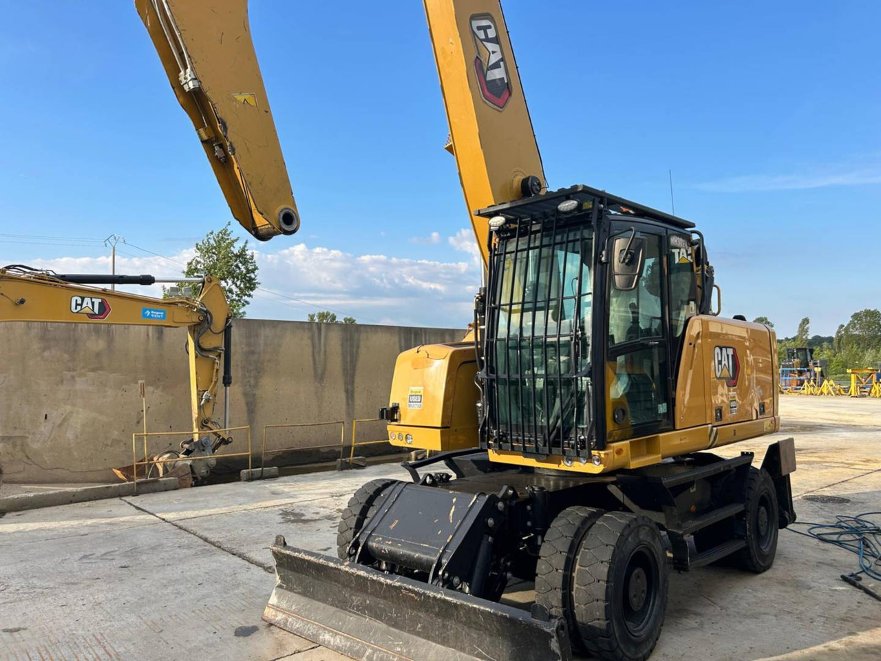 CAT MH3024-1 - Grävmaskin på däck: bild 1 CAT MH3024-1 - Grävmaskin på däck: bild 1